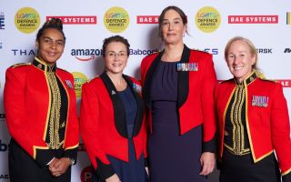 Colonel Grace Sangster-Wall (second from right) pictured with other guests at the 2025 LGBTQ+ Defence Awards (Picture: LGBTQ+ Defence Awards)