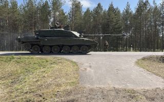 A Challenger 2 tank on the road during Exercise Spring Storm CRED BFBS
