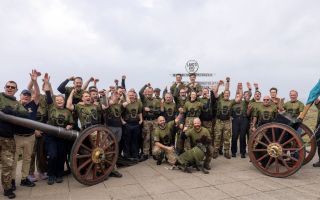 Big cheers as the team of volunteers finished off their epic challenge in Land's End, Cornwall