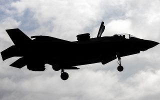 An F-35B Lightning operated by 617 Squadron comes in to land on Operation Highmast - displaying the B variant's short take-off/vertical landing capability