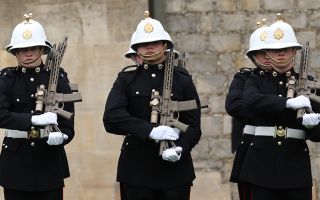 Royal Marines slope arms with their latest assault rifle - the Knight's Armament KS-1 (Picture: MOD)