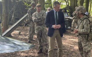 Defence Secretary Dan Jarvis, flanked by the Chief of the General Staff General Sir Roly Walker, speaks to personnel at the launch of the AI battle lab (Picture: BFBS)