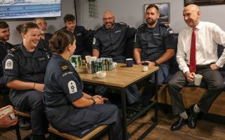 Mr Healey meets with the ship's crew of HMS Prince of Wales during its visit to Tokyo as part of the Carrier Strike Group deployment to the Indo-Pacific in 2025 (Picture: MOD)