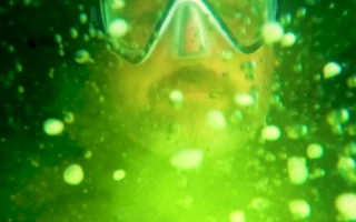 Luxbios underwater lighting illuminating a diver