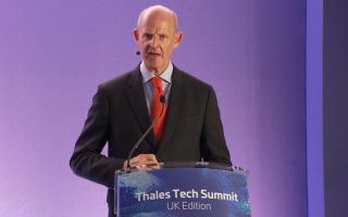 Rupert Pierce, the newly appointed National Armaments Director, speaking at the Thales Tech Summit (Picture: BFBS)