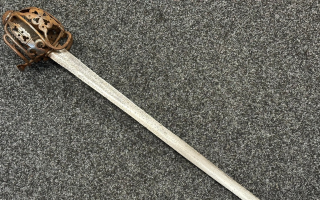18122025 mid 18th Century Scottish Basket Hilt Sword CREDIT Bamfords Auctioneers and Valuers