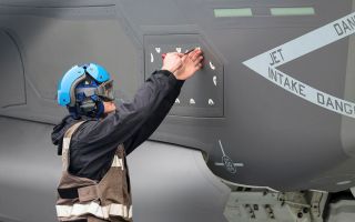 An 809 Naval Air Squadron aircraft engineer prepares an F-35B Lightning for take-off during Neptune Strike 26-3, a multi-domain enhanced vigilance activity exercise (Picture: MOD)