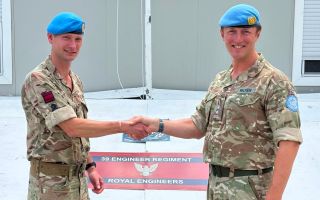 Lt Col Gledhill (left) assumes command of 39 Engineers from Lt Col Walker (Picture: BFBS)