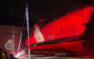 Type 31 Frigate HMS Active being rolled out of the build hall in Rosyth