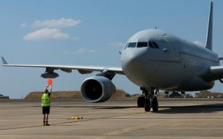 A Royal Air Force Voyager is marshalled into its parking spot at RAAF Base Darwin (Picture: MOD)