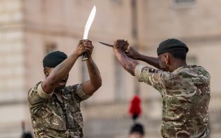 Gurkha perform a traditional kukri display Horse Guards 080726 CREDIT MOD