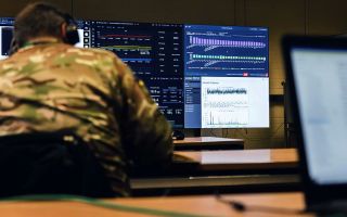 Soldiers deployed on Exercise Army Cyber Spartan taking part in creating traffic for the network in order to enable the Blue and Red teams