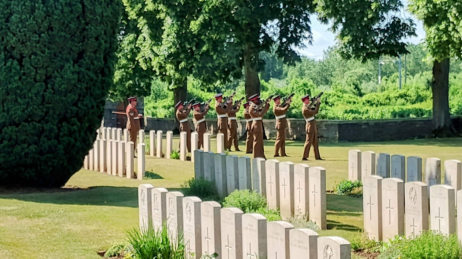 Volley of shots is fired at the burial of Pte Joe Stevenson and two other unidentified WW1 soldiers CREDIT Crown Copyright